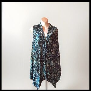 Adore Size Large sleeveless V neck asymmetrical topper